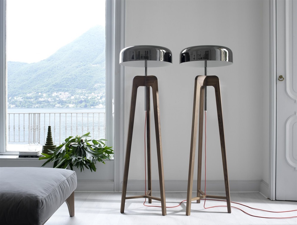 Pileo floor lamp in solid canaletta walnut or ash with tin-plated shade.